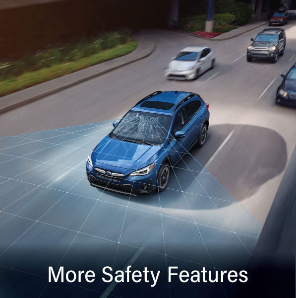 A Subaru Crosstrek in blue with the words &ldquo;More Safety Features&ldquo;. | Sutherlin Subaru in Kingston TN